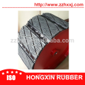 Conveyor pulley lagging traction pads